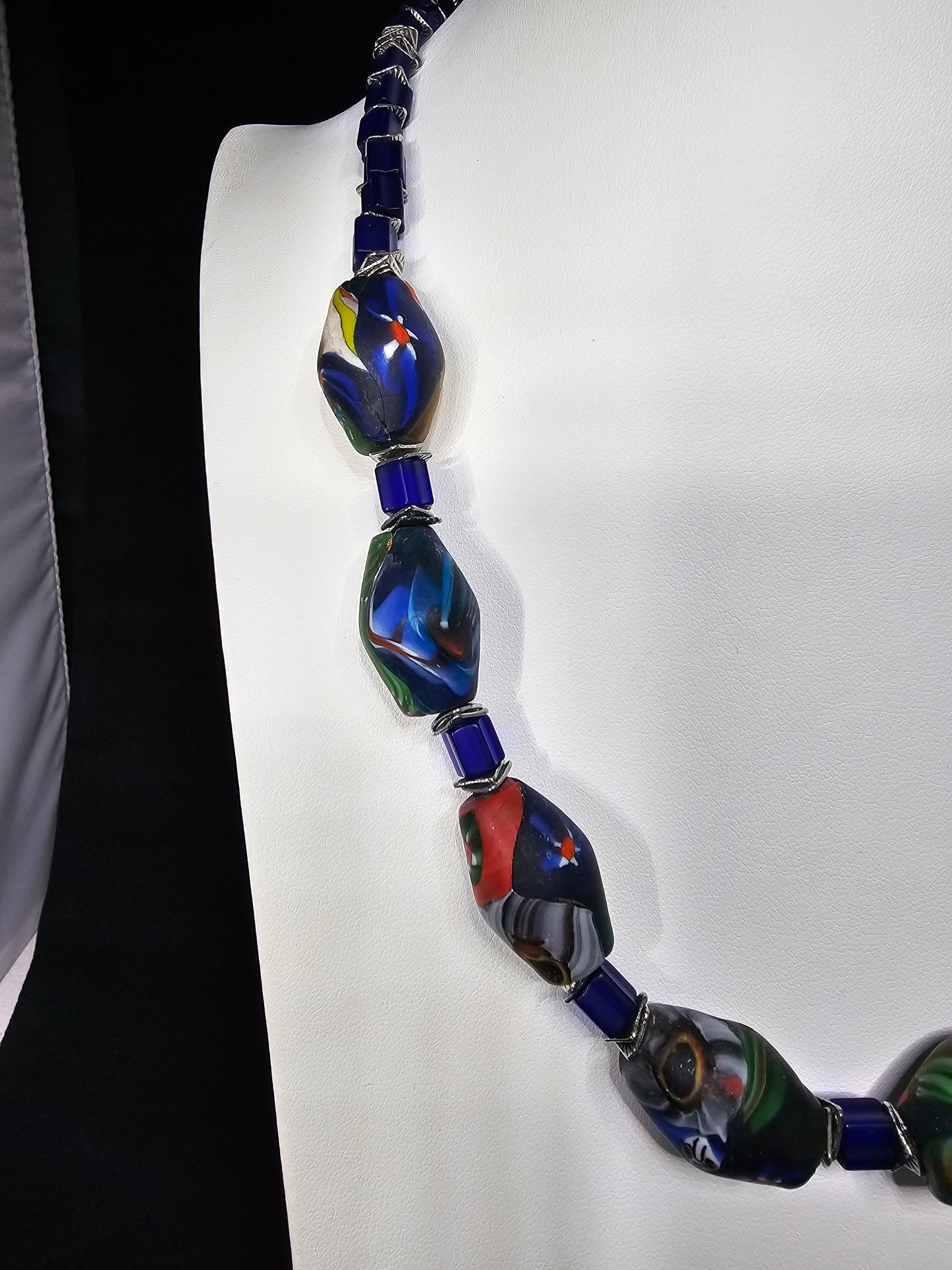 Cobalt Blue Abstract Multicolored Hexagon Bead with Textured Blue Beads and Silver Hammered Discs Spacers Necklance