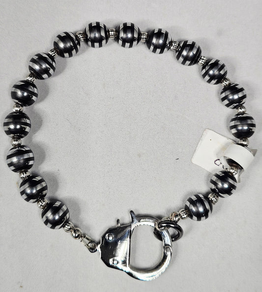 Silver Stripe Hematite Metal Bead Bracelet with Silver Spacers and a Handcuff Clasp